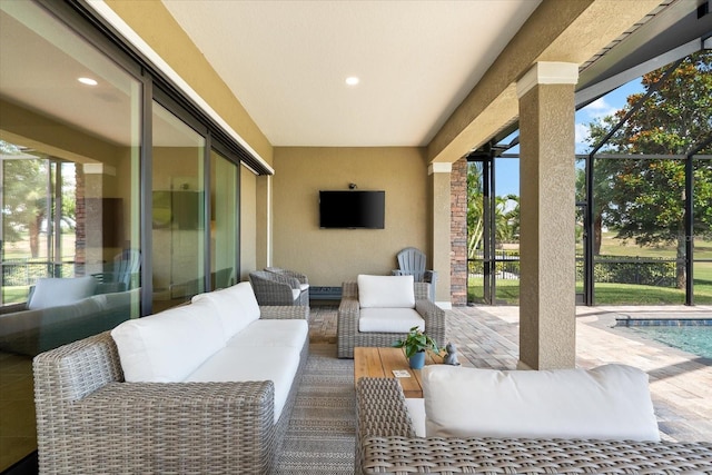 1416 Via Verdi Dr, Palm Harbor, FL 34683 - view of patio with an outdoor hangout area, an outdoor pool, and glass enclosure