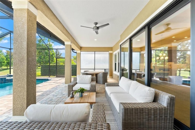 1416 Via Verdi Dr, Palm Harbor, FL 34683 - sunroom / solarium featuring ceiling fan, an outdoor living space, and a pool