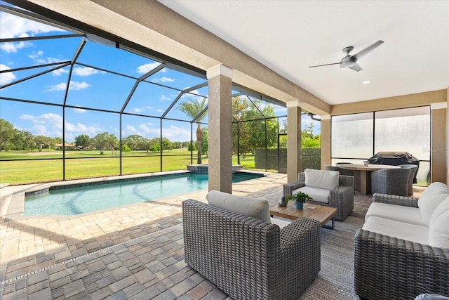 1416 Via Verdi Dr, Palm Harbor, FL 34683 - view of patio with an outdoor living space, a ceiling fan, an outdoor pool, and glass enclosure