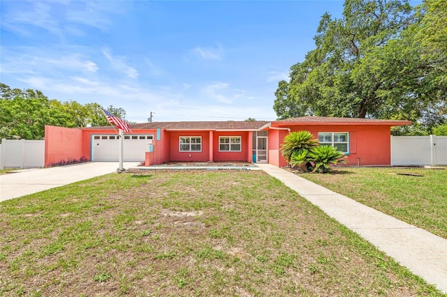 603 Royal Crest Dr, Brandon, FL 33511 - ranch-style house with a garage, driveway, and stucco siding