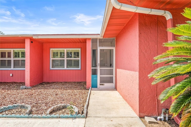 603 Royal Crest Dr, Brandon, FL 33511 - doorway to property with stucco siding