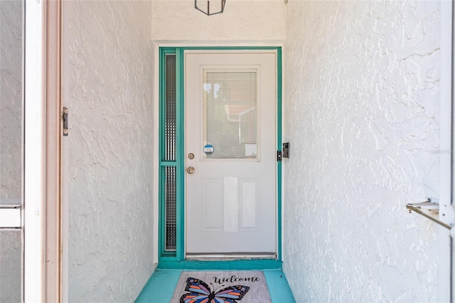 603 Royal Crest Dr, Brandon, FL 33511 - doorway to property with stucco siding