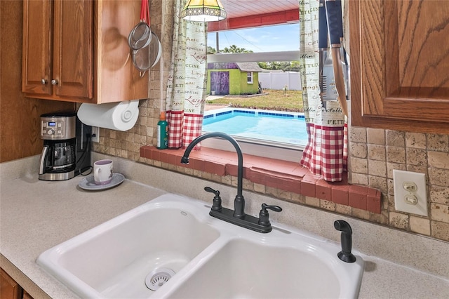 603 Royal Crest Dr, Brandon, FL 33511 - kitchen view of a sink, brown cabinets, and light countertops