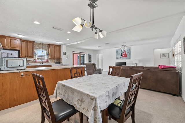 603 Royal Crest Dr, Brandon, FL 33511 - dining area featuring light carpet, recessed lighting, and ceiling fan