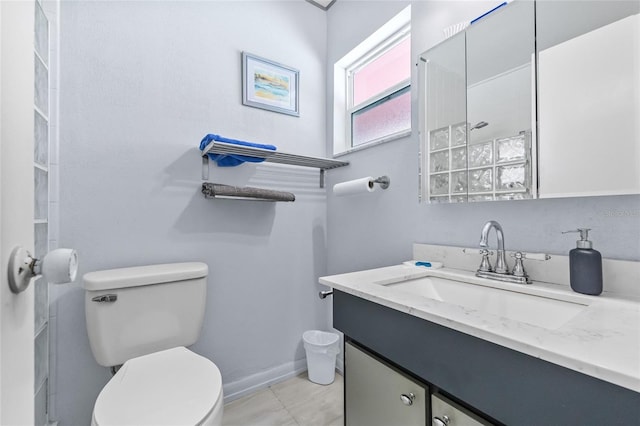 603 Royal Crest Dr, Brandon, FL 33511 - bathroom featuring toilet, vanity, and baseboards