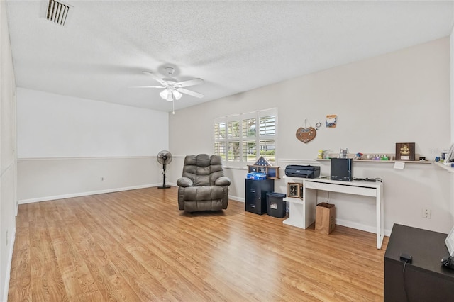 603 Royal Crest Dr, Brandon, FL 33511 - office area featuring wood finished floors, ceiling fan, a textured ceiling, and baseboards
