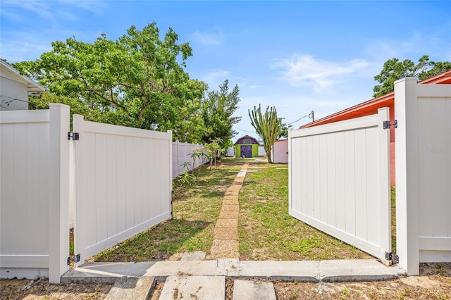 603 Royal Crest Dr, Brandon, FL 33511 - view of yard featuring a gate