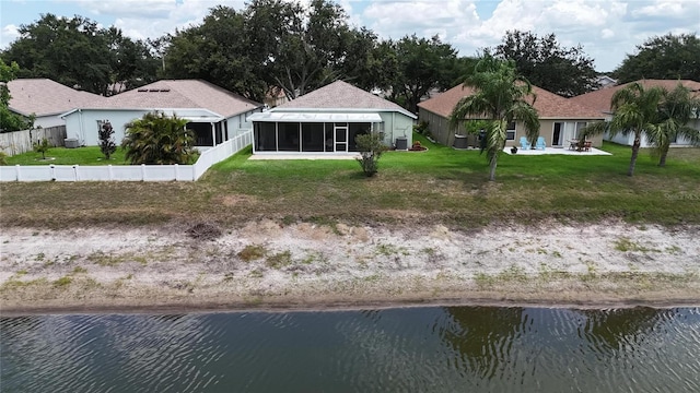 10449 Hunters Haven Blvd, Riverview, FL 33578 - rear view of property with a sunroom, a water view, central air condition unit, and a patio area