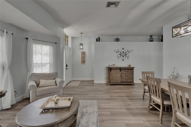 10449 Hunters Haven Blvd, Riverview, FL 33578 - living area featuring light wood finished floors and baseboards