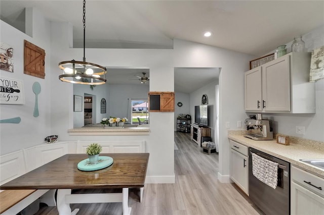 10449 Hunters Haven Blvd, Riverview, FL 33578 - dining area featuring lofted ceiling, a chandelier, light wood-type flooring, a ceiling fan, and recessed lighting