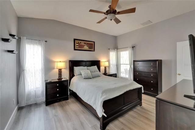 10449 Hunters Haven Blvd, Riverview, FL 33578 - bedroom featuring light wood-style flooring, lofted ceiling, baseboards, and a ceiling fan