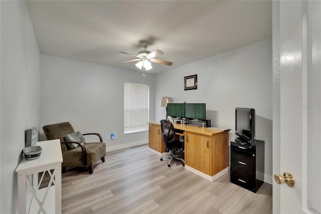 10449 Hunters Haven Blvd, Riverview, FL 33578 - office with light wood-style floors, ceiling fan, and baseboards