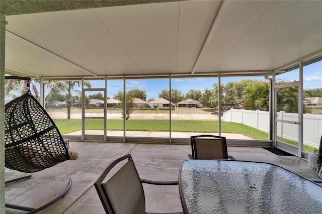 10449 Hunters Haven Blvd, Riverview, FL 33578 - sunroom featuring outdoor dining area and a residential view