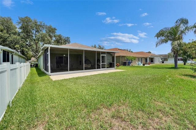 10449 Hunters Haven Blvd, Riverview, FL 33578 - rear view of property featuring a sunroom and central air condition unit