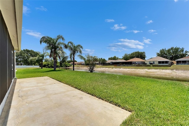 10449 Hunters Haven Blvd, Riverview, FL 33578 - view of grassy yard with a patio