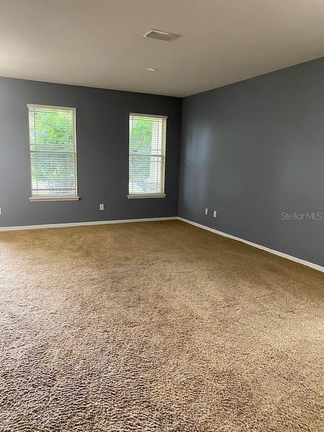 12202 Fairlawn Dr, Riverview, FL 33579 - carpeted spare room featuring baseboards