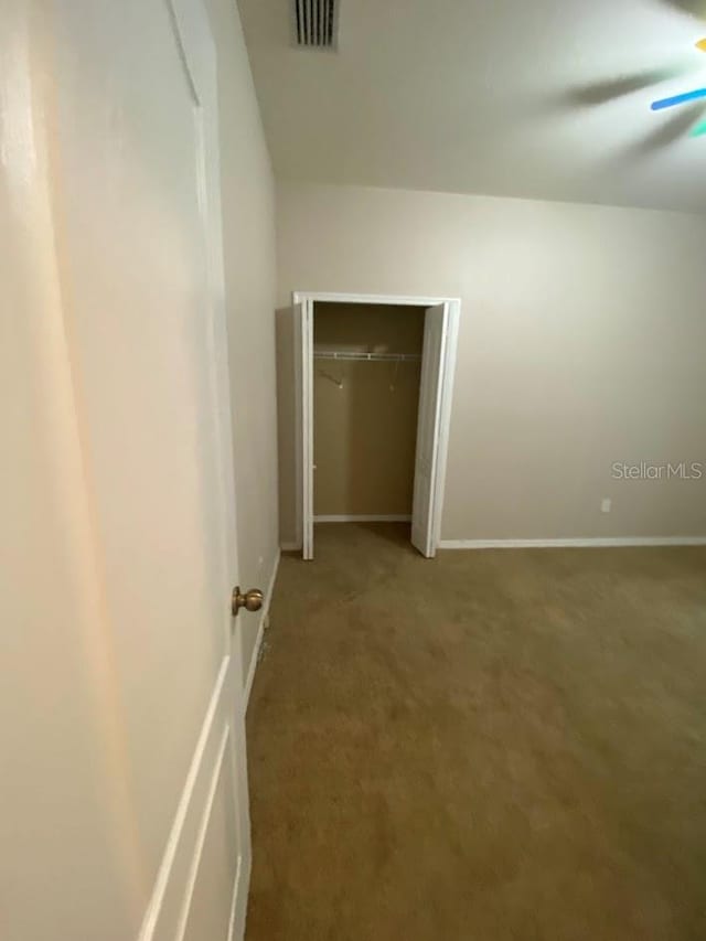 12202 Fairlawn Dr, Riverview, FL 33579 - unfurnished room featuring carpet flooring, a ceiling fan, and baseboards