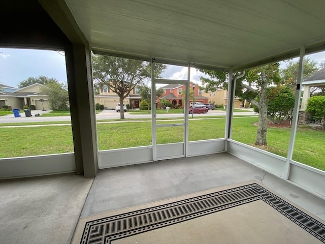 12202 Fairlawn Dr, Riverview, FL 33579 - unfurnished sunroom with a residential view