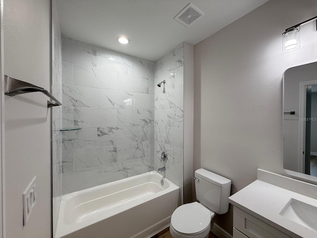 17099 Carleen Ave, Port Charlotte, FL 33948 - full bath featuring  shower combination, vanity, toilet, and recessed lighting