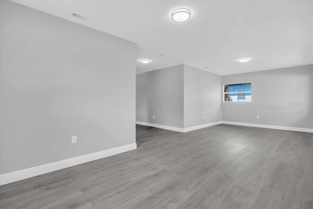 2711 E 22nd Ave, Tampa, FL 33605 - empty room featuring baseboards and wood finished floors