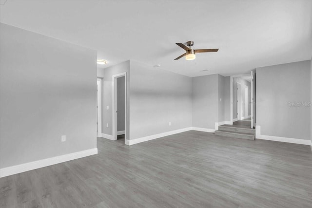 2711 E 22nd Ave, Tampa, FL 33605 - spare room with baseboards, ceiling fan, and wood finished floors