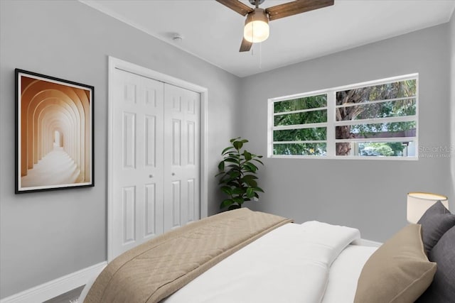 2711 E 22nd Ave, Tampa, FL 33605 - bedroom featuring a closet, baseboards, and a ceiling fan