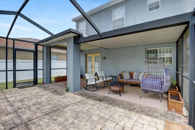 11121 Running Pine Dr, Riverview, FL 33569 - view of patio featuring french doors, an outdoor fire pit, and glass enclosure