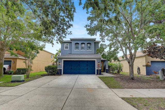 11121 Running Pine Dr, Riverview, FL 33569 - front facade featuring an attached garage, concrete driveway, and stucco siding