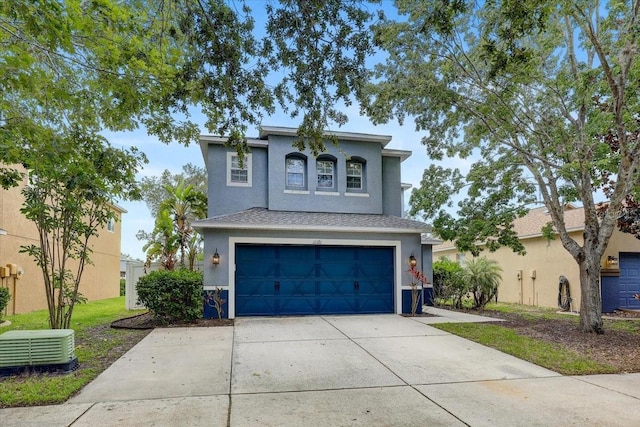11121 Running Pine Dr, Riverview, FL 33569 - view of front facade with an attached garage, driveway, and stucco siding