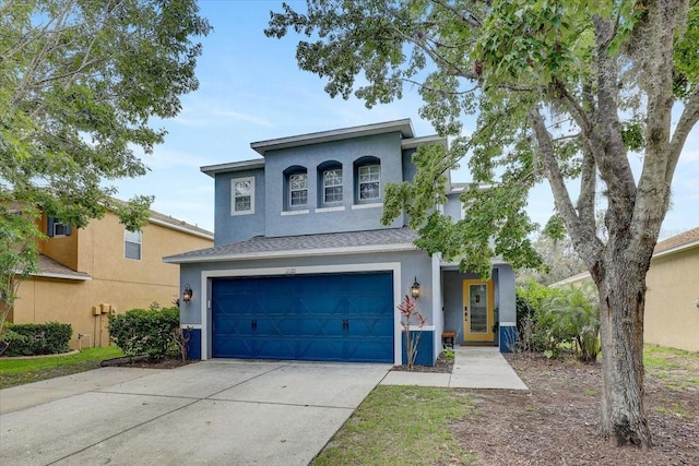 11121 Running Pine Dr, Riverview, FL 33569 - view of front of home featuring an attached garage, stucco siding, and driveway