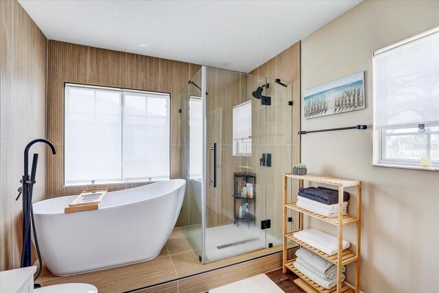 11121 Running Pine Dr, Riverview, FL 33569 - bathroom with a shower stall and a freestanding bath