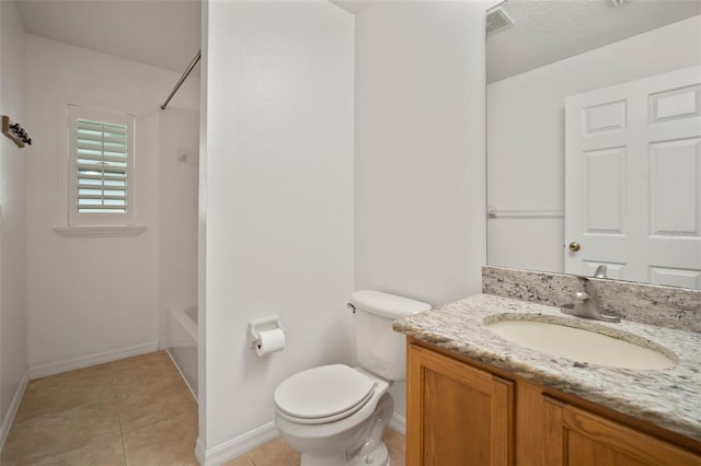 full bathroom featuring toilet, baseboards, vanity, and tile patterned flooring
