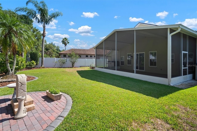 view of yard with a sunroom