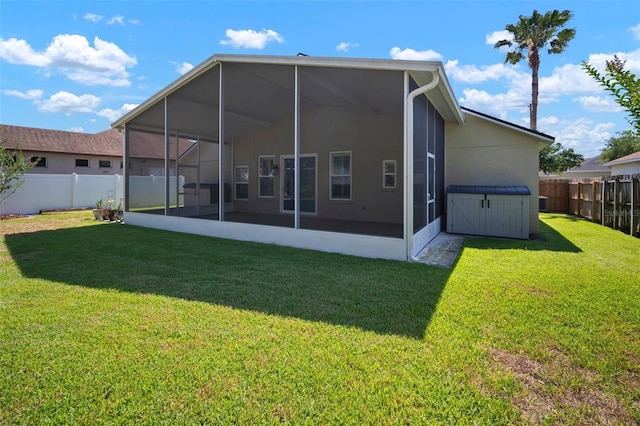 rear view of house with a sunroom