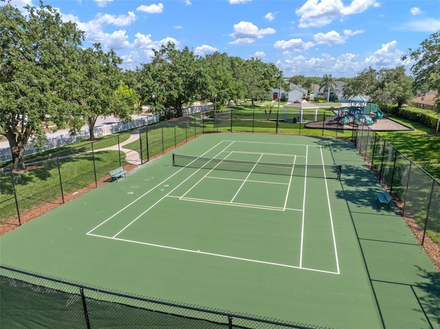 view of tennis court with community basketball court