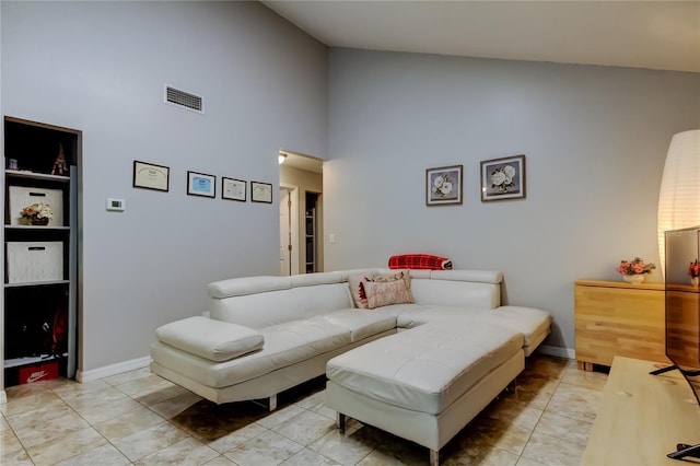 2721 Baird Ct, Palm Harbor, FL 34684 - living area with high vaulted ceiling and baseboards