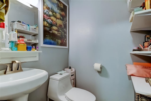 2721 Baird Ct, Palm Harbor, FL 34684 - bathroom with a sink and toilet