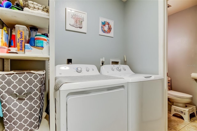 2721 Baird Ct, Palm Harbor, FL 34684 - washroom with washer and clothes dryer and tile patterned floors