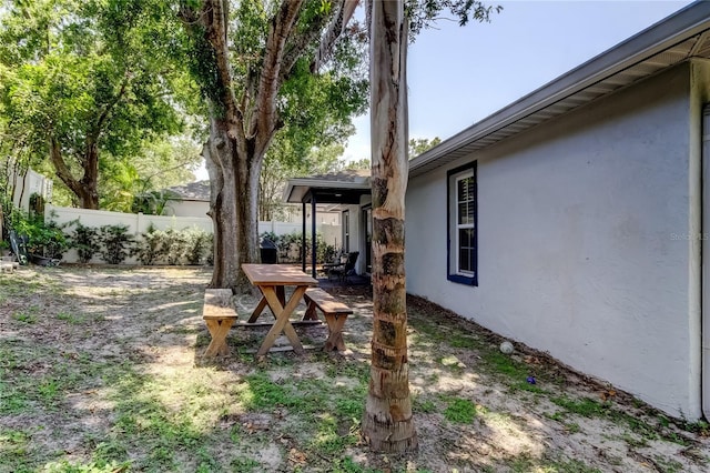 2721 Baird Ct, Palm Harbor, FL 34684 - view of yard featuring fence and a patio area