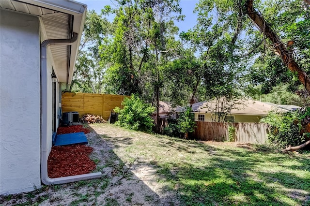 2721 Baird Ct, Palm Harbor, FL 34684 - view of yard featuring central AC unit