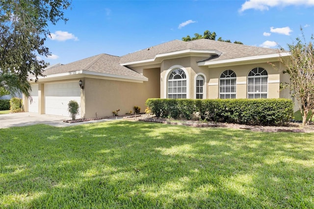 3023 Minuteman Ln, Brandon, FL 33511 - view of front of home featuring stucco siding, a garage, a front lawn, and driveway