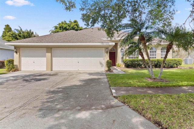 3023 Minuteman Ln, Brandon, FL 33511 - view of front of house with concrete driveway, a front lawn, stucco siding, and an attached garage