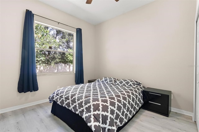 3023 Minuteman Ln, Brandon, FL 33511 - bedroom with wood finished floors, baseboards, and ceiling fan