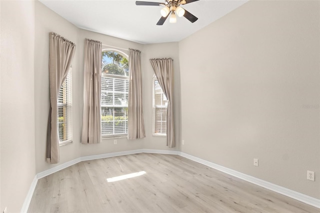 3023 Minuteman Ln, Brandon, FL 33511 - unfurnished room with light wood-style floors, ceiling fan, and baseboards