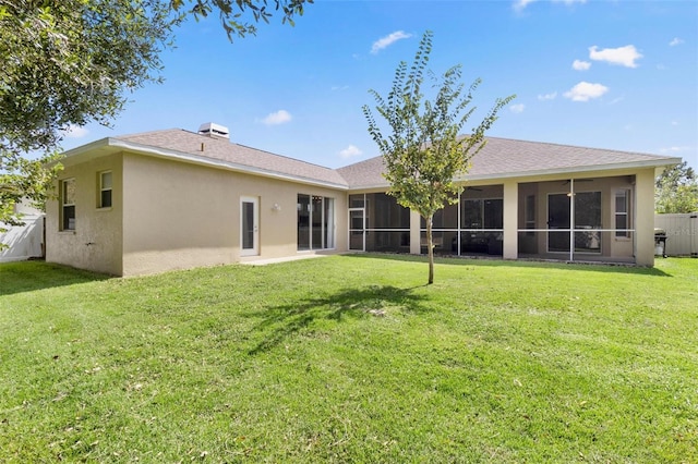 3023 Minuteman Ln, Brandon, FL 33511 - rear view of house featuring a sunroom and stucco siding