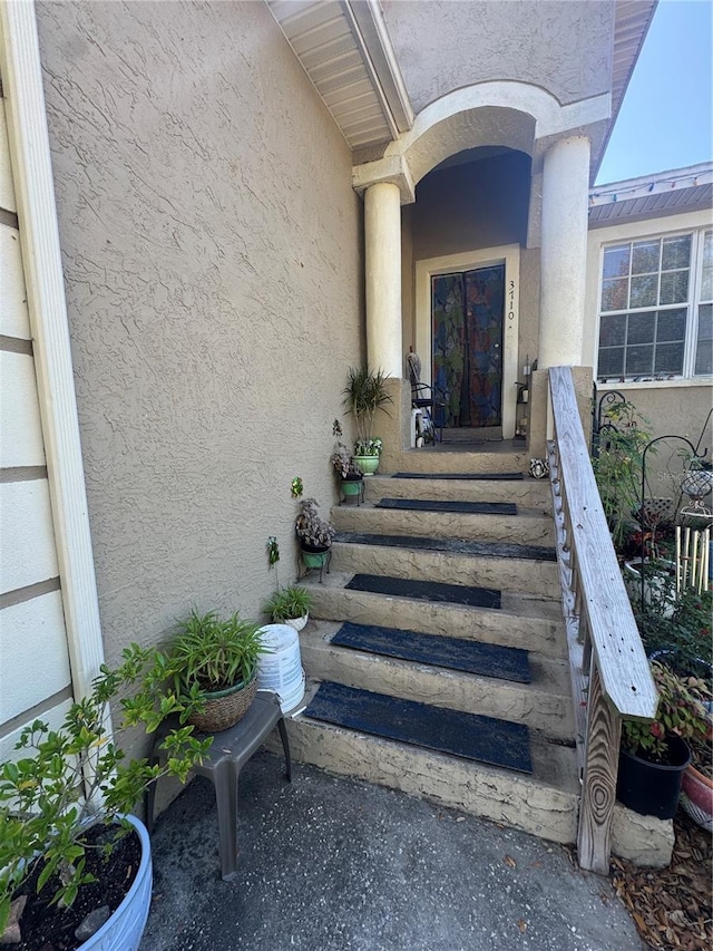 3710 N 57th St, Tampa, FL 33619 - property entrance with stucco siding