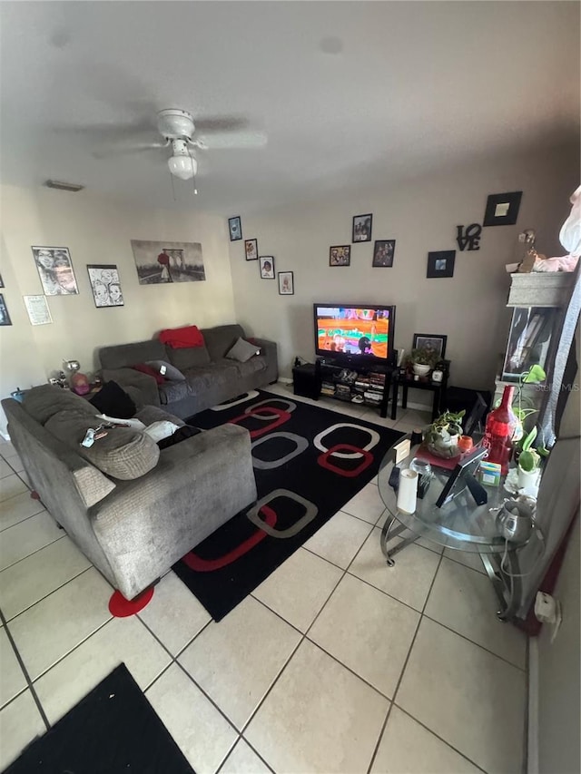 3710 N 57th St, Tampa, FL 33619 - living area with tile patterned floors and ceiling fan