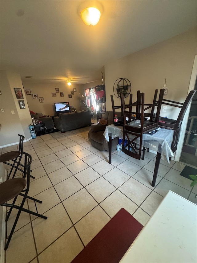 3710 N 57th St, Tampa, FL 33619 - living area with light tile patterned floors