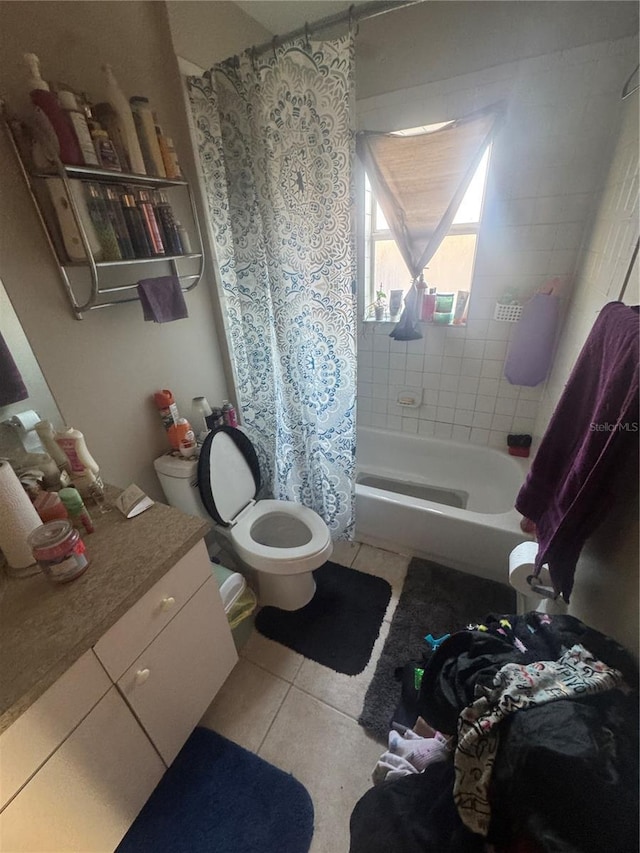 3710 N 57th St, Tampa, FL 33619 - full bathroom with tile patterned flooring, toilet, vanity, and shower / bath combination with curtain