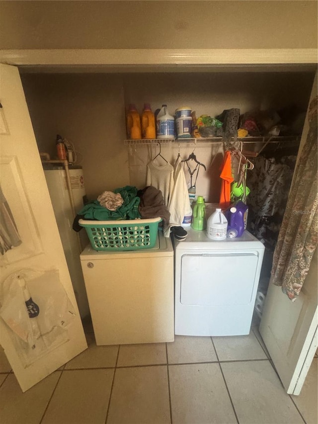 3710 N 57th St, Tampa, FL 33619 - laundry area featuring washer and dryer and tile patterned floors
